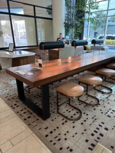 a table with chairs in a room