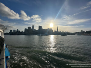 a city skyline with a body of water