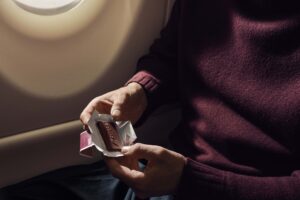 a person holding a chocolate bar