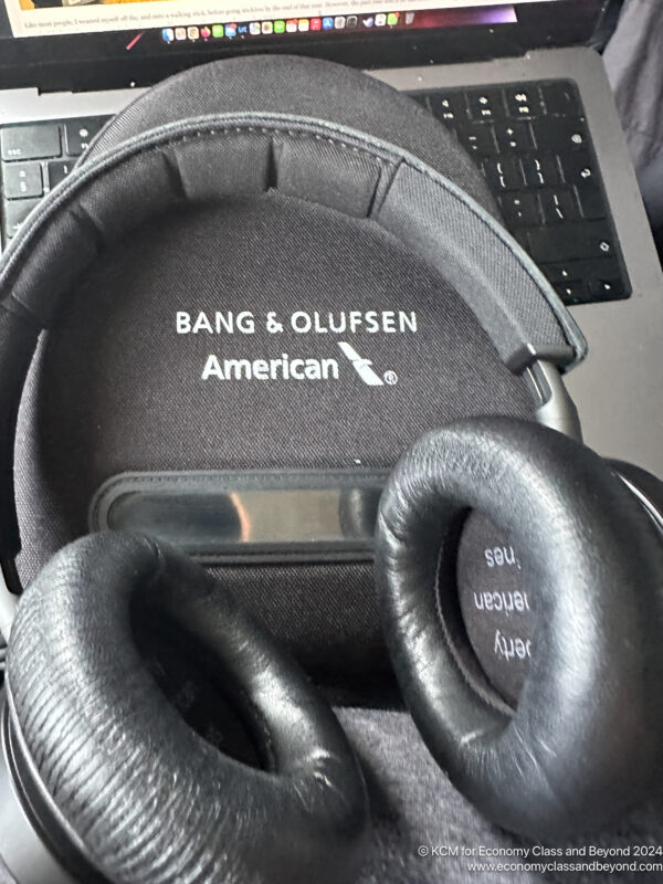a black headphones on a laptop