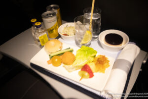 a plate of food and drinks on a table