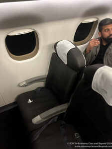 a man sitting in a plane