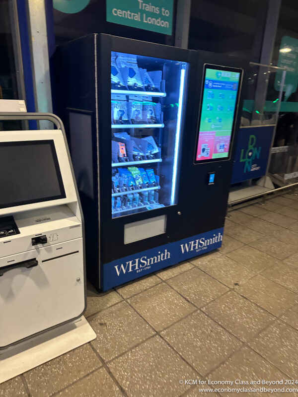 a vending machine with a screen and a computer