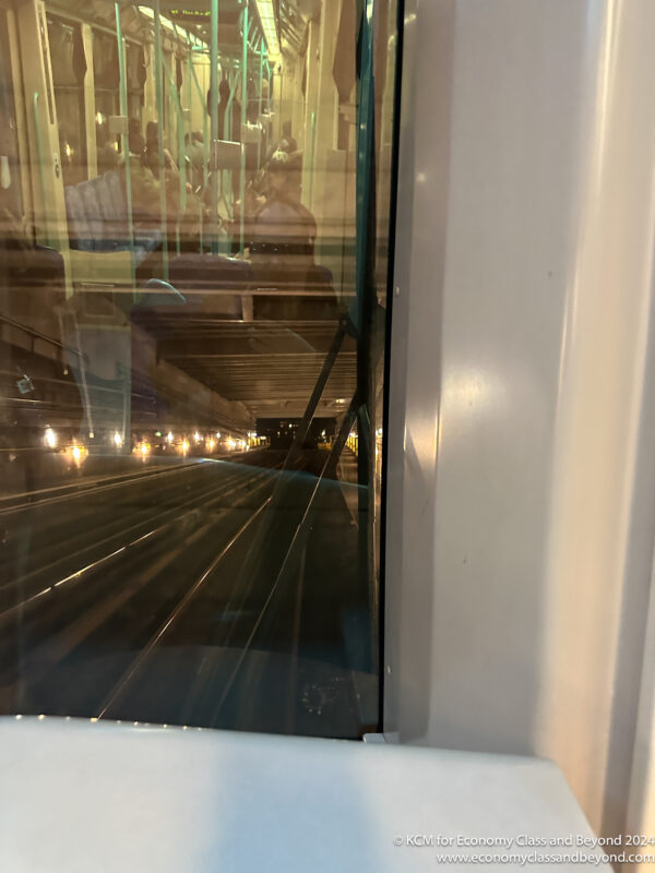 a train tracks seen through a window