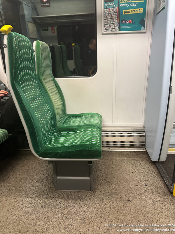 a green seats in a train