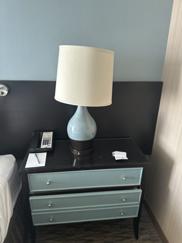 a lamp on a nightstand