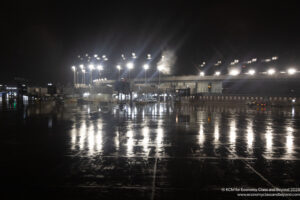 a building with lights on the ground