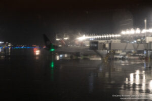 a plane on the tarmac at night