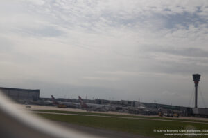 a group of airplanes at an airport