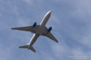 a plane flying in the sky