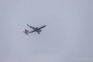 an airplane flying in the sky