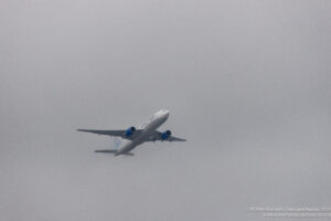 an airplane flying in the sky