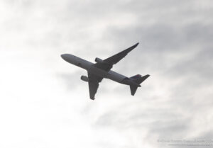 an airplane flying in the sky