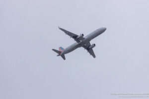 an airplane flying in the sky