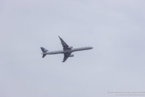 a plane flying in the sky