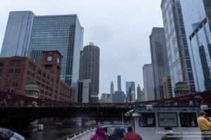 a group of people on a boat in a city