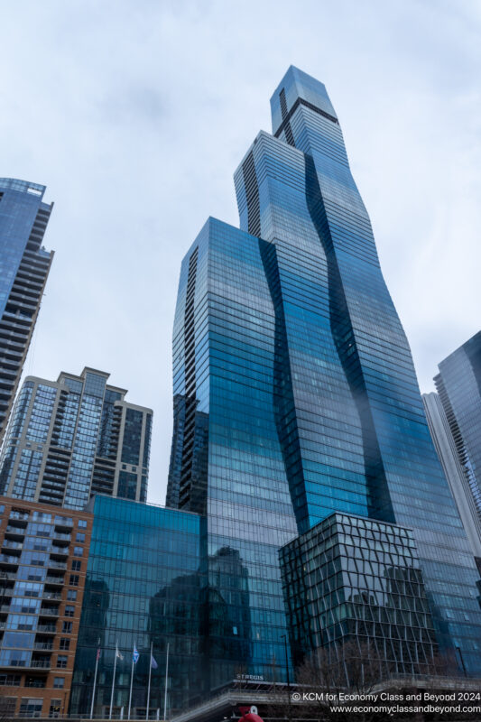 a tall glass skyscrapers in a city
