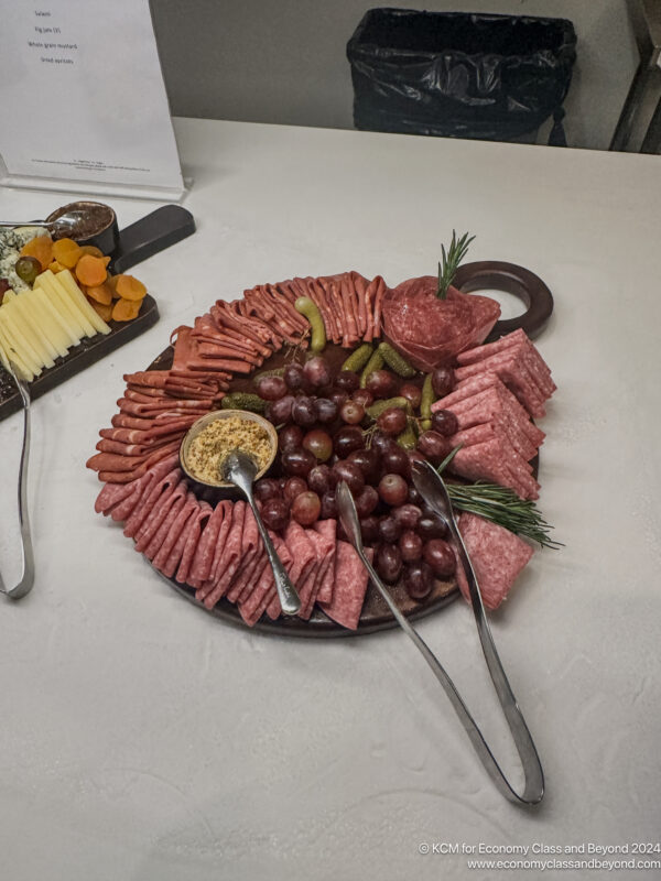 a platter of meat and cheese