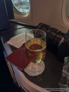 a glass of liquid on a table