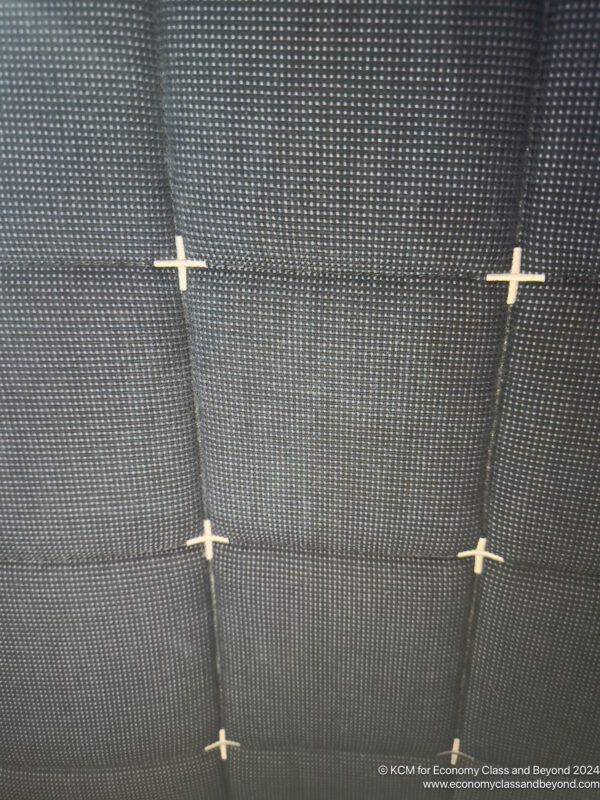 a black fabric with white crosses