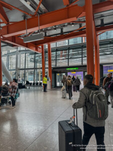 a group of people in a terminal