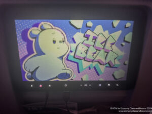 a computer screen with a cartoon bear and text