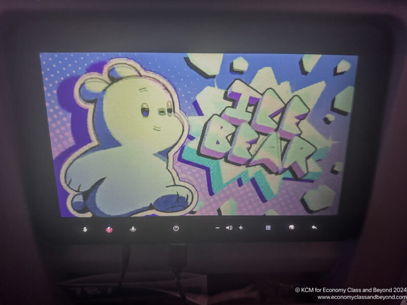 a computer screen with a cartoon bear and text