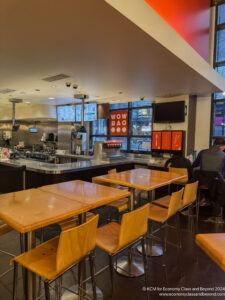 a restaurant with tables and chairs