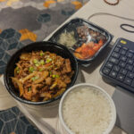 a bowl of food and a keyboard
