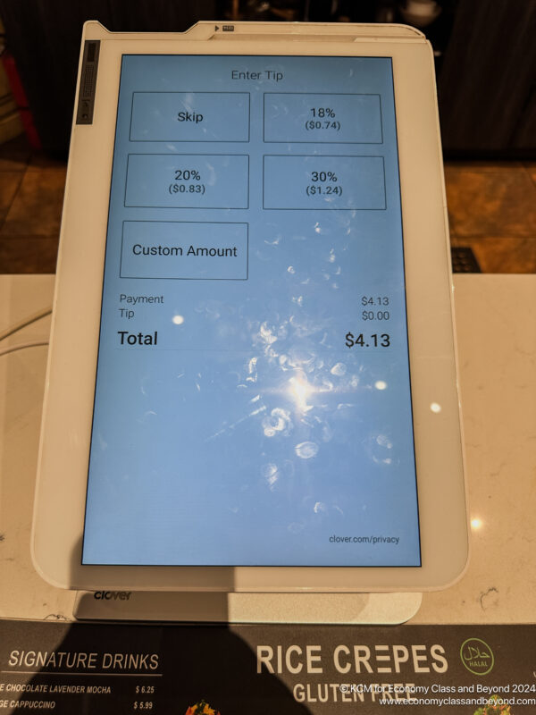 a tablet with a screen showing numbers and prices