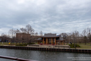 a building next to a body of water