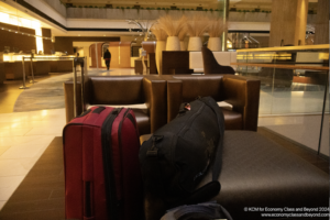 a luggage on a chair in a lobby