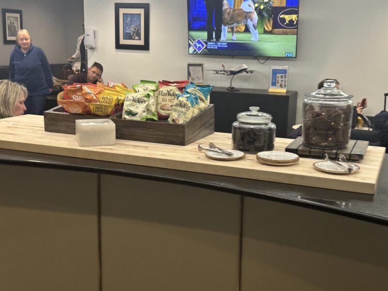 a counter with food and a tv