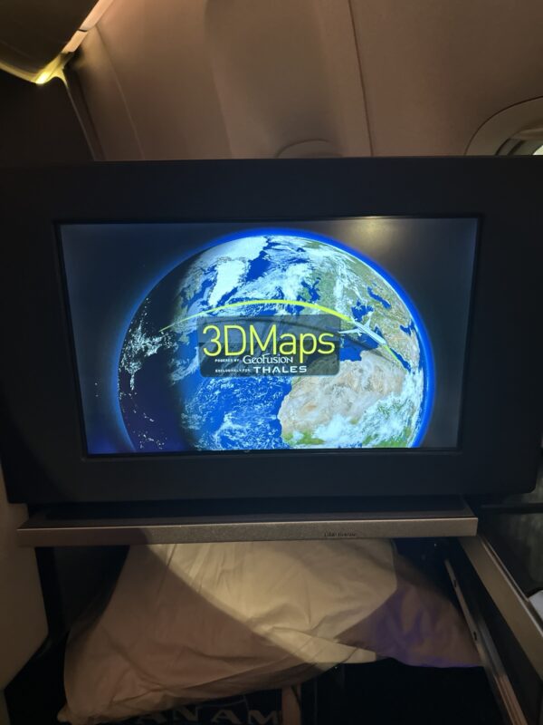 a television screen on a plane