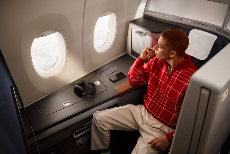 a man sitting in an airplane