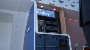 a blue pantry with a blue sign