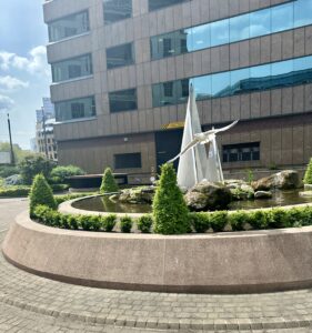 a fountain in front of a building