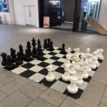 a chess board with chess pieces on it