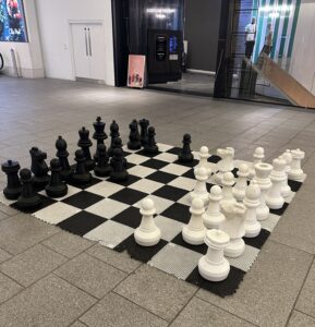 a chess board with chess pieces on it