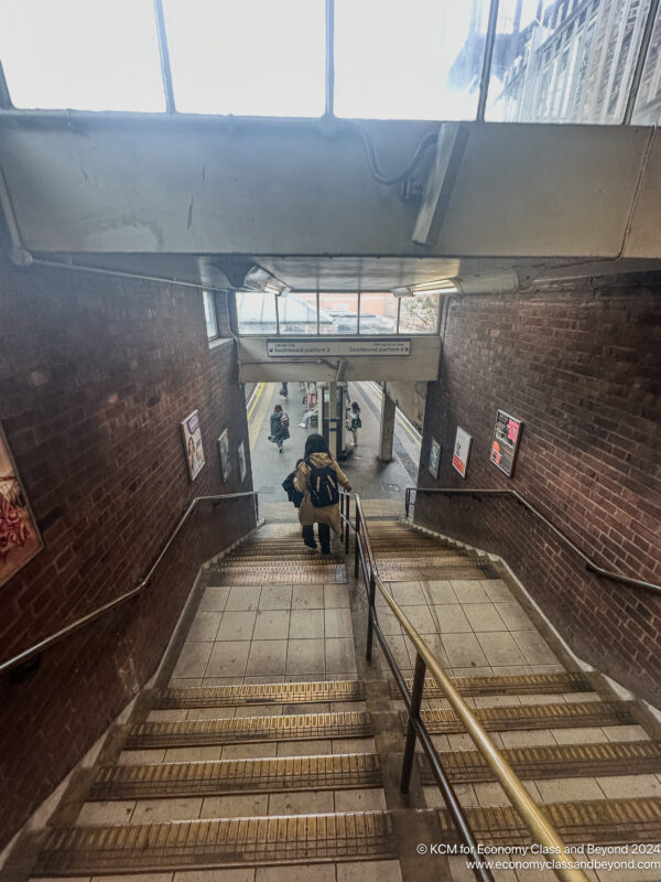 a person walking up a staircase