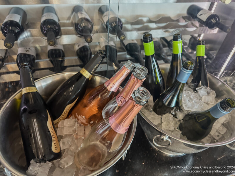 a group of bottles in a bucket of ice