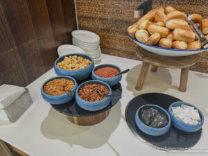 a group of bowls of food on a table