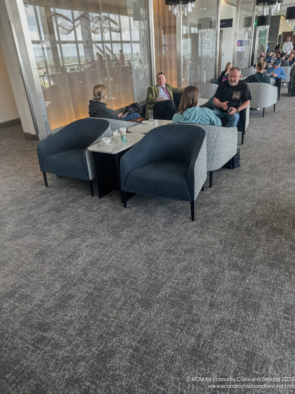 a group of people sitting in chairs