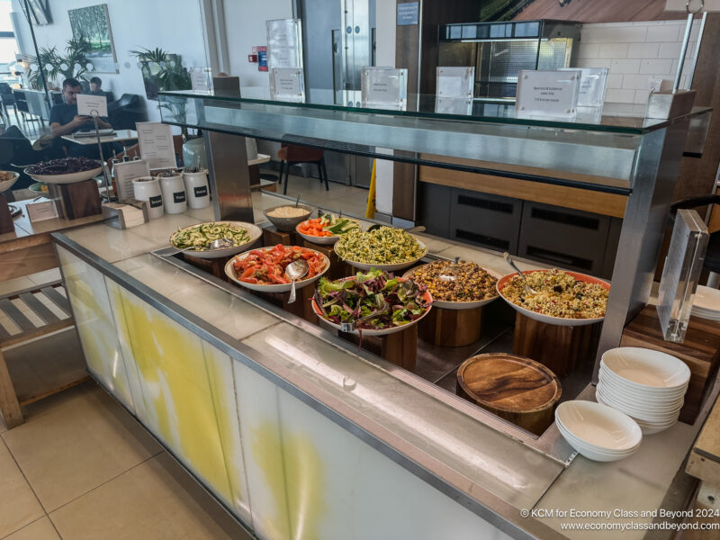 a buffet with food in bowls