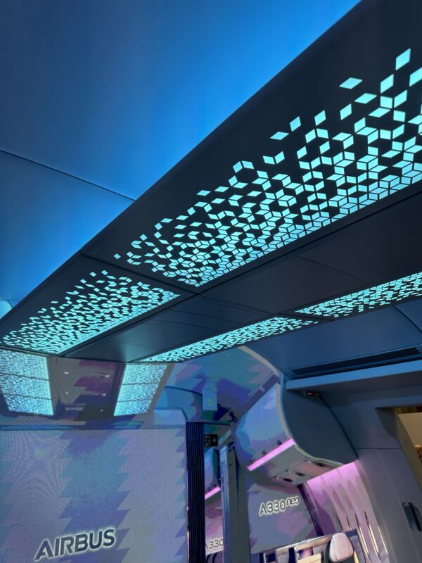 a blue and white lights on a ceiling