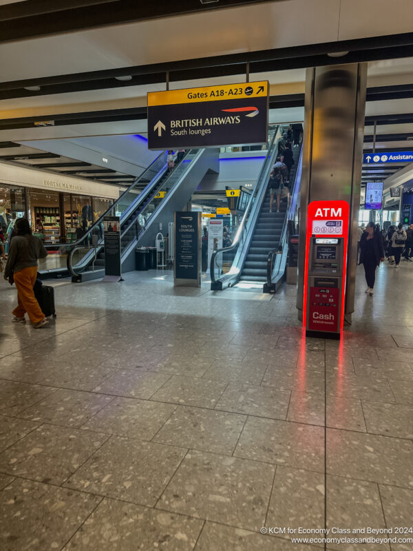 a group of people walking in a building