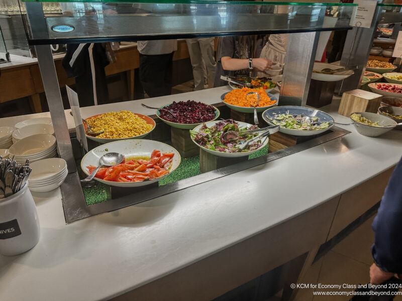 a buffet with different food on it