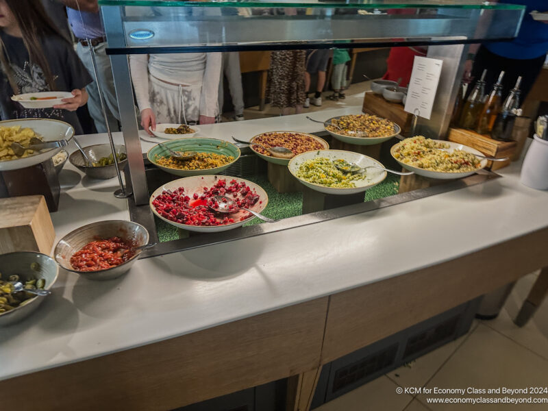 a buffet with bowls of food