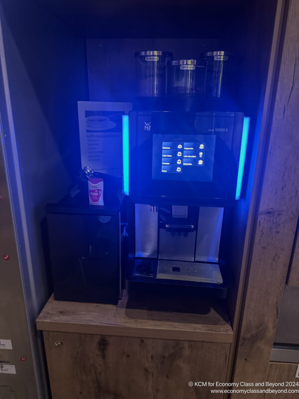 a coffee machine with a blue light