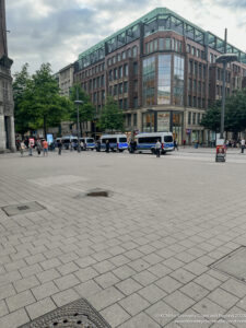 a group of people walking in a city